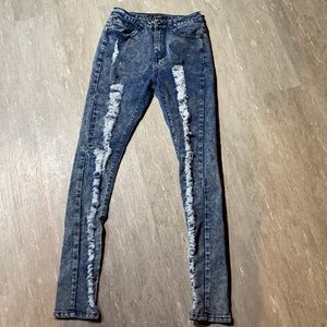 Distressed Jeans. Medium wash. One button